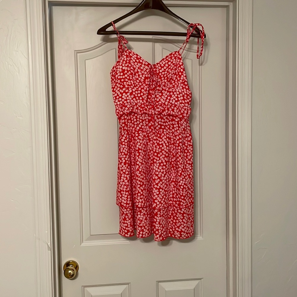 Like new, worn once. Spaghetti strap mini dress. White and red floral pattern.
